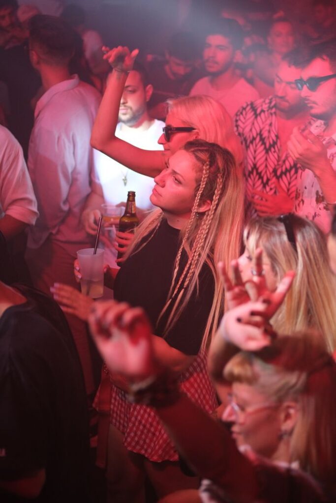Crafting Captivating Headlines: Your awesome post title goes here Crowd enjoying a vibrant nightlife experience at a busy nightclub.
